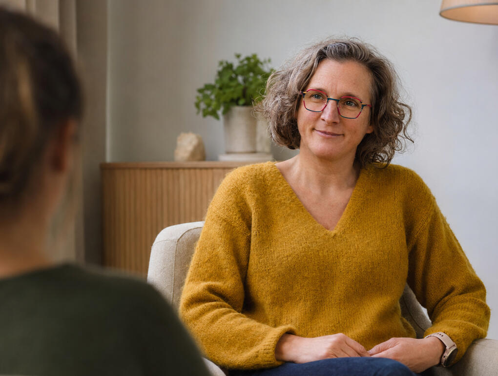 Ils luistert tijdens een individuele coachingssessie